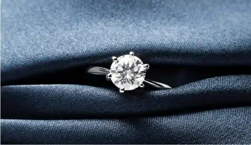 925 silver ring on a blue cloth